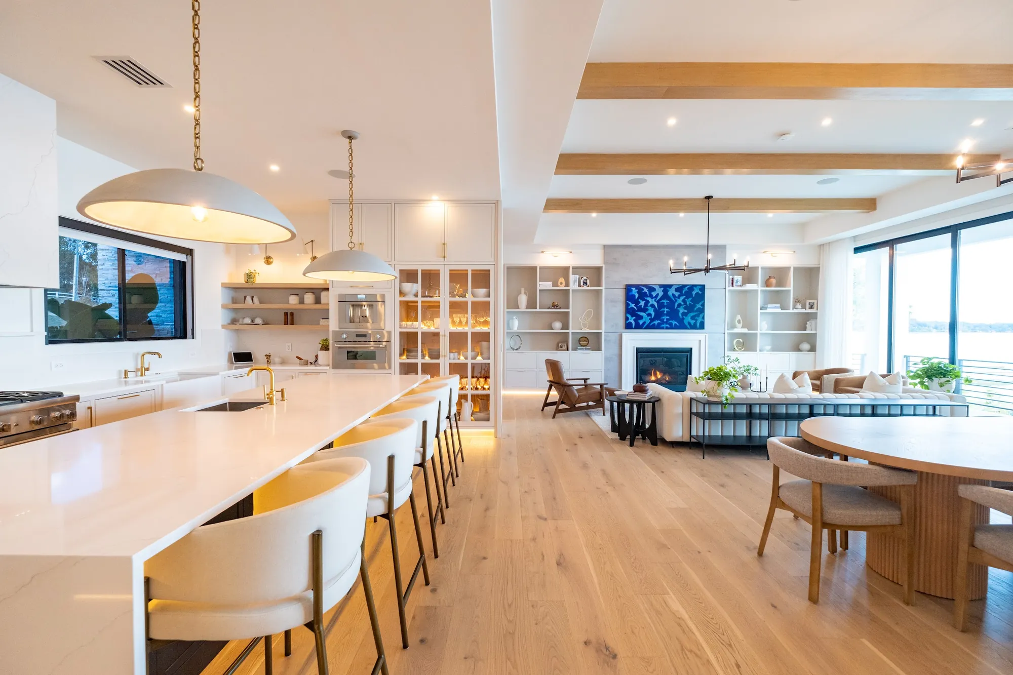 Custom open plan kitchen and dining area built by Domu Cabinets