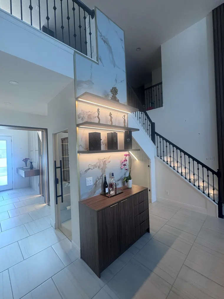 Wine cabinet under the stairs